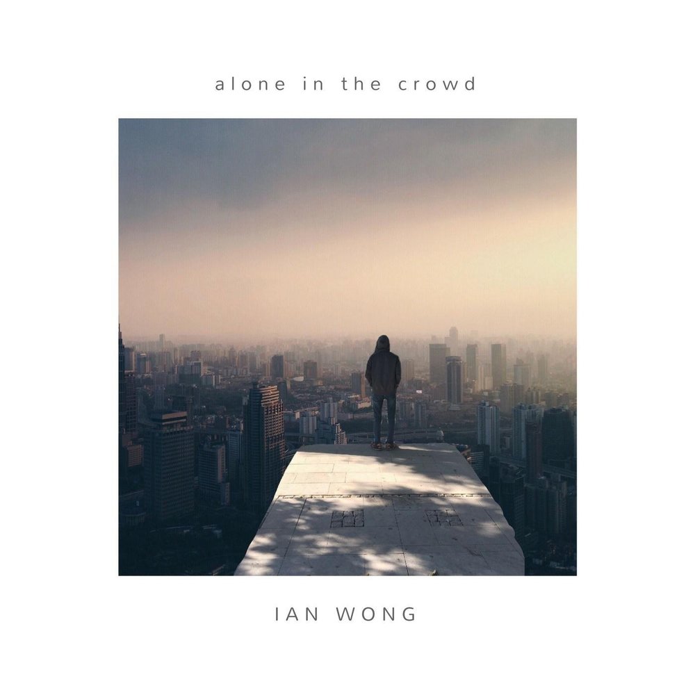 Alone in a crowd. Alone in the crowd.