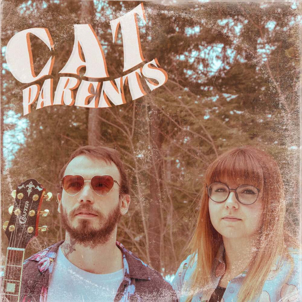 Cat parents. Ivory Tower [USA] - eatin' out of my hand.