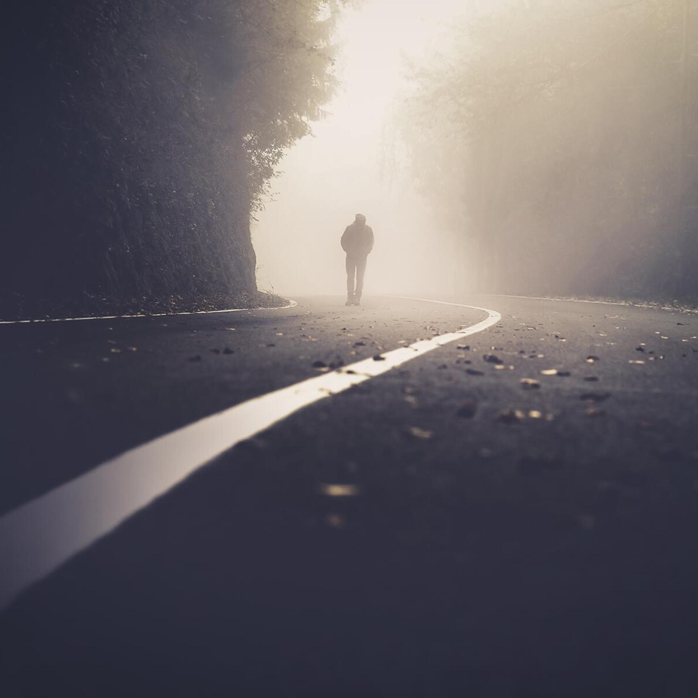 Lonely road. Человек идет к свету. Человек идет в тумане. Man Walking in Rain.