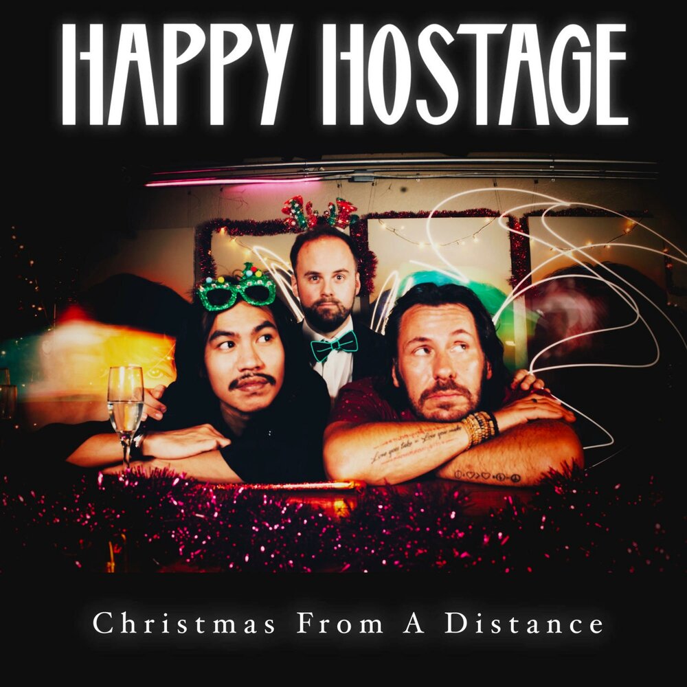 Happy Hostage альбом Christmas From A Distance слушать онлайн бесплатно на ...