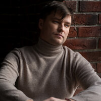 Роман Мальков